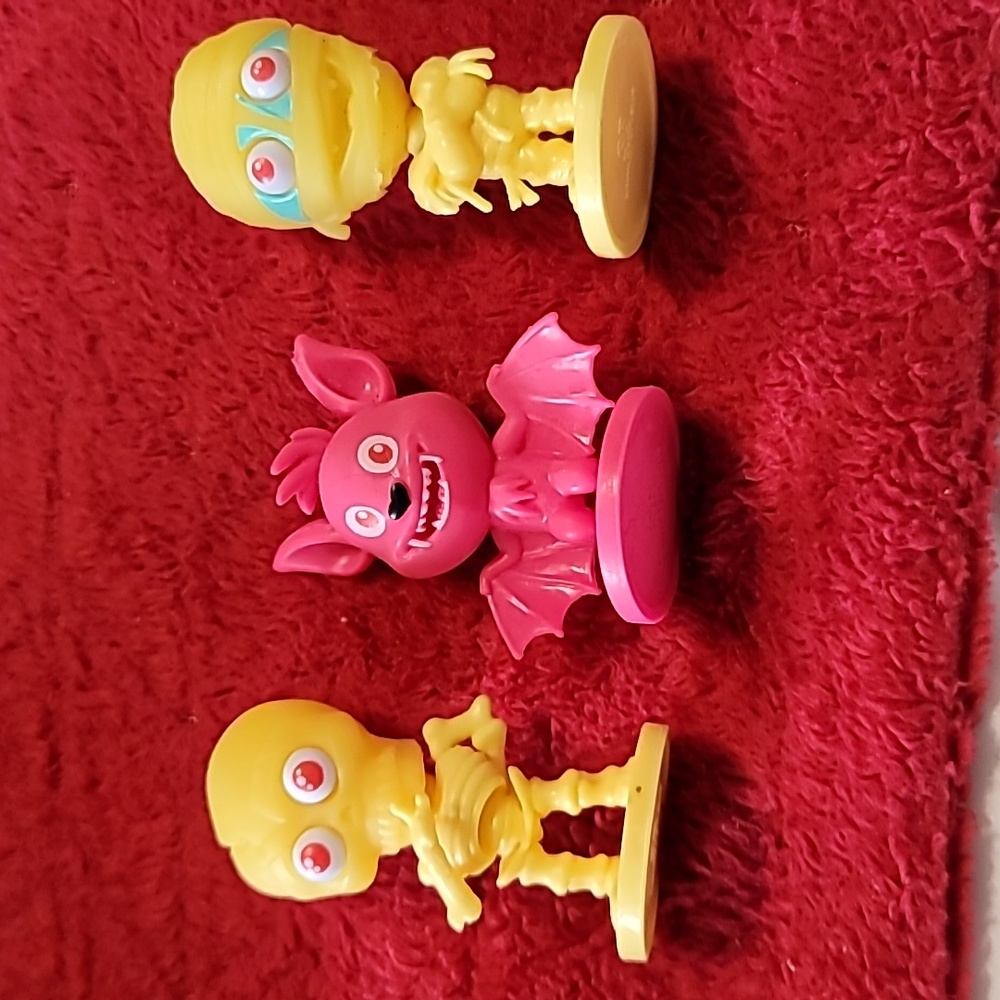 Three figures from the Sweet Box Zombaki Fluffies Magic toy collection.